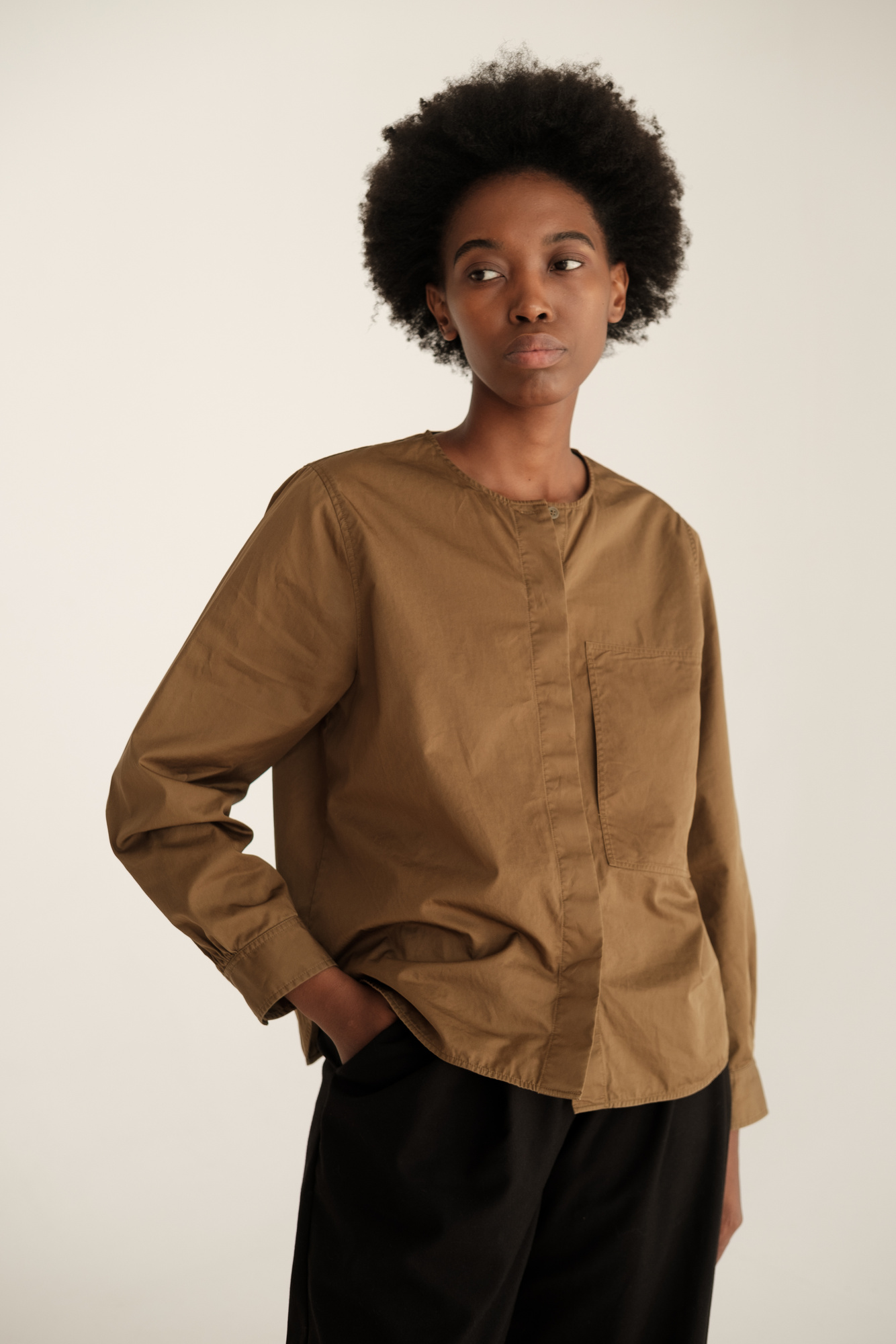 Woman in Casual Brown Dress Shirt and Slacks